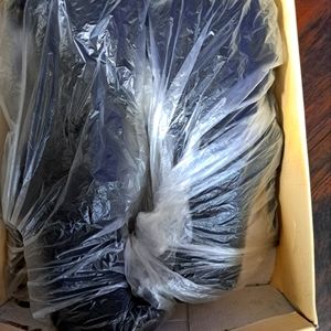 Brand new black suede mariah carey knee high boots ..gold bottoms size 6..